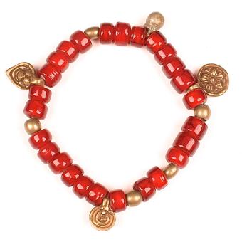 Armband | rode glaskralen en bedeltjes