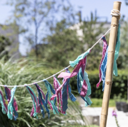 tassel garland slinger lichte kleuren katoen cotton detail